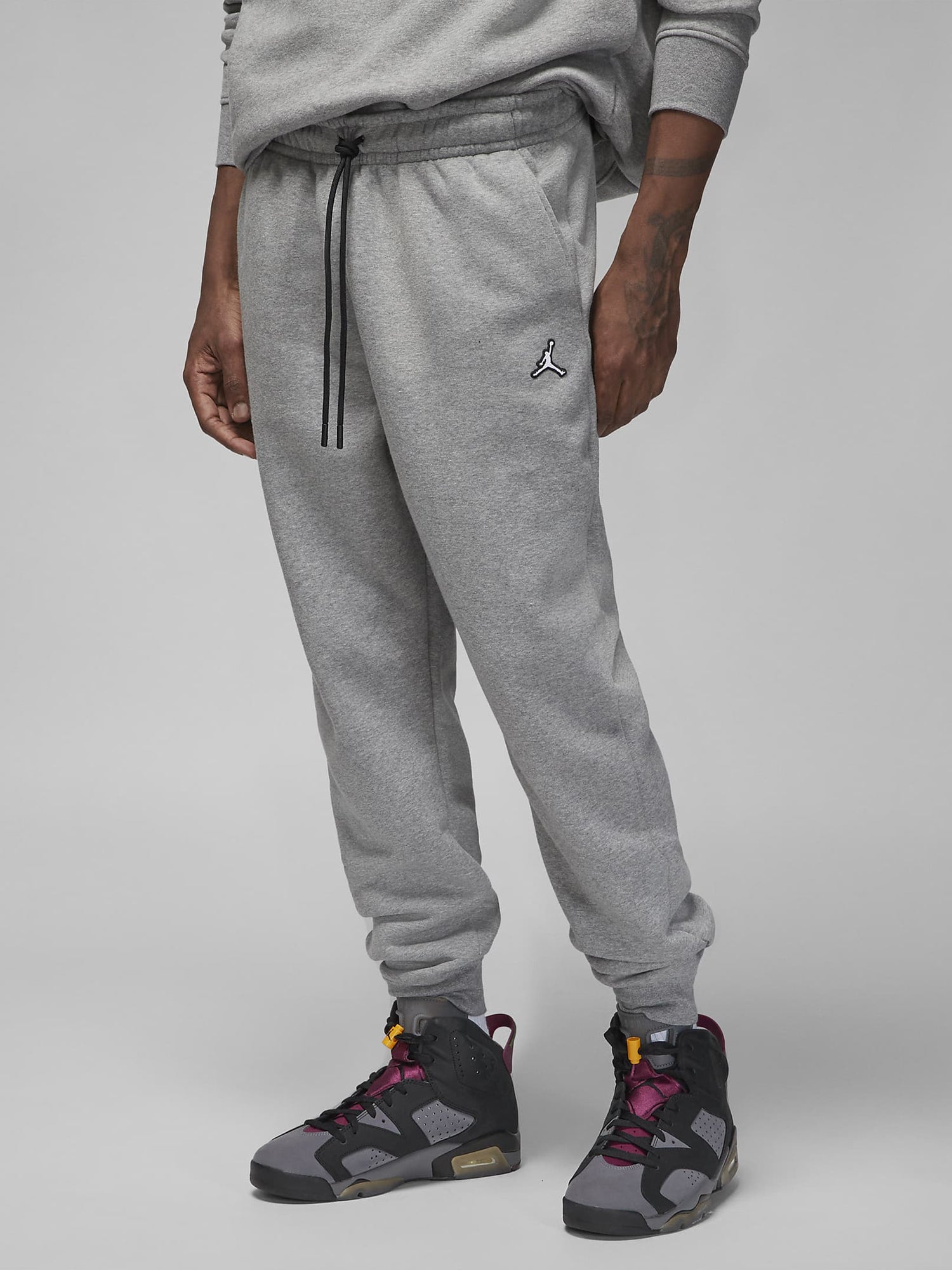 JORDAN PANTALONI TUTA ESSENTIAL GRIGIO