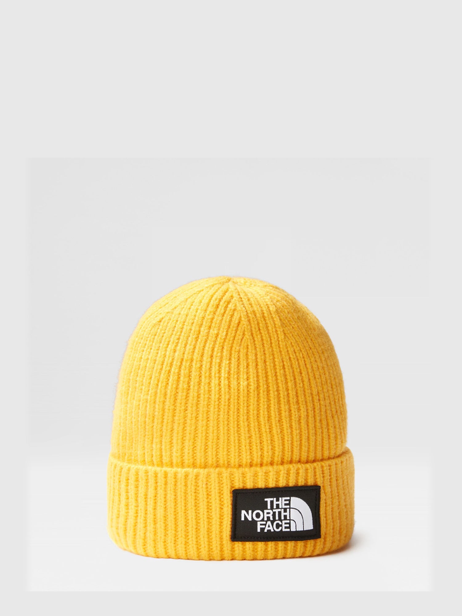 THE NORTH FACE CAPPELLO CON RISVOLTO E LOGO BOX GIALLO