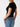 Guess t-shirt scollo a v con logo mini triangolo
