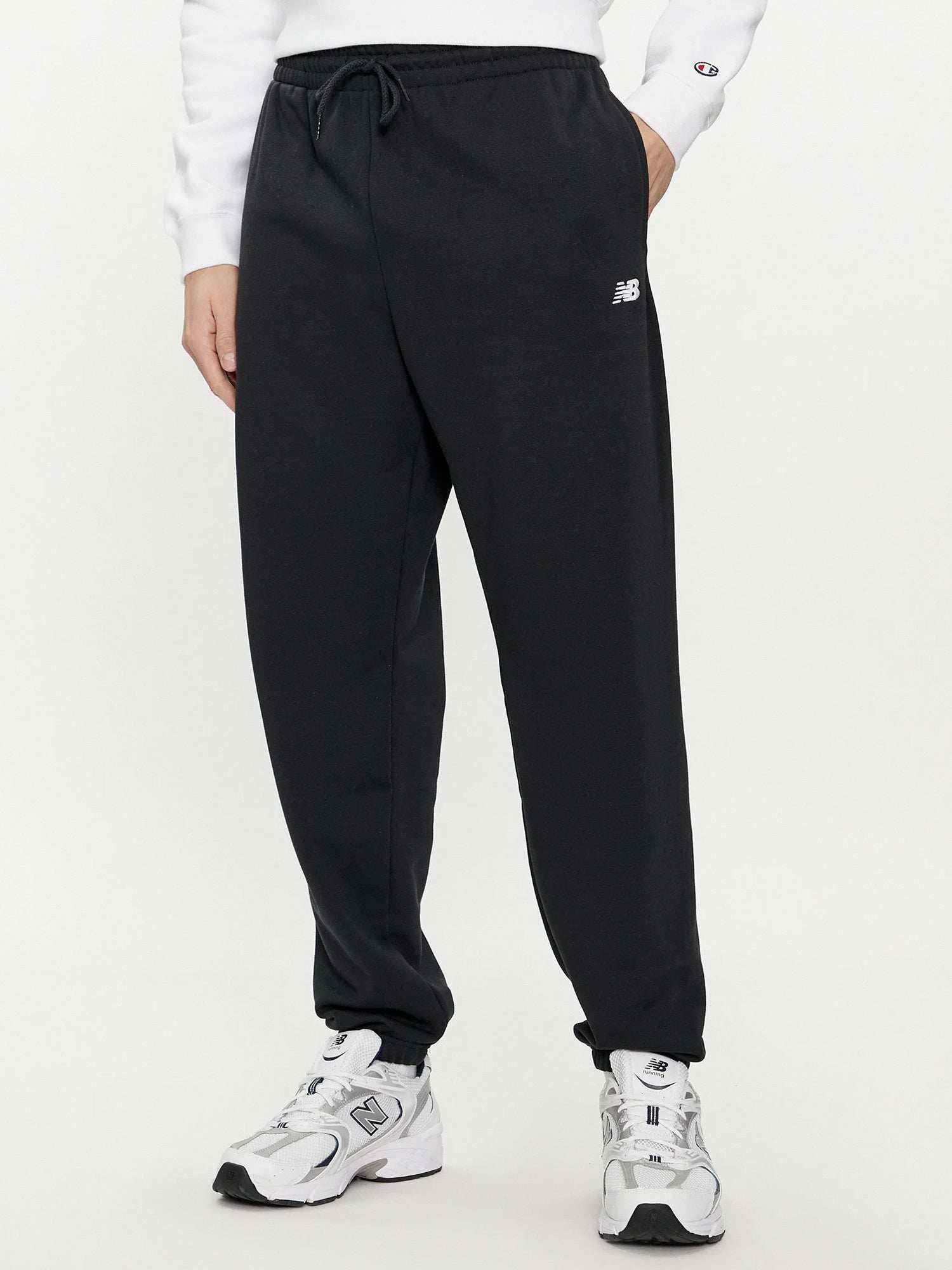 NEW BALANCE PANTALONI SPORTIVI FRENCH TERRY JOGGER NERO