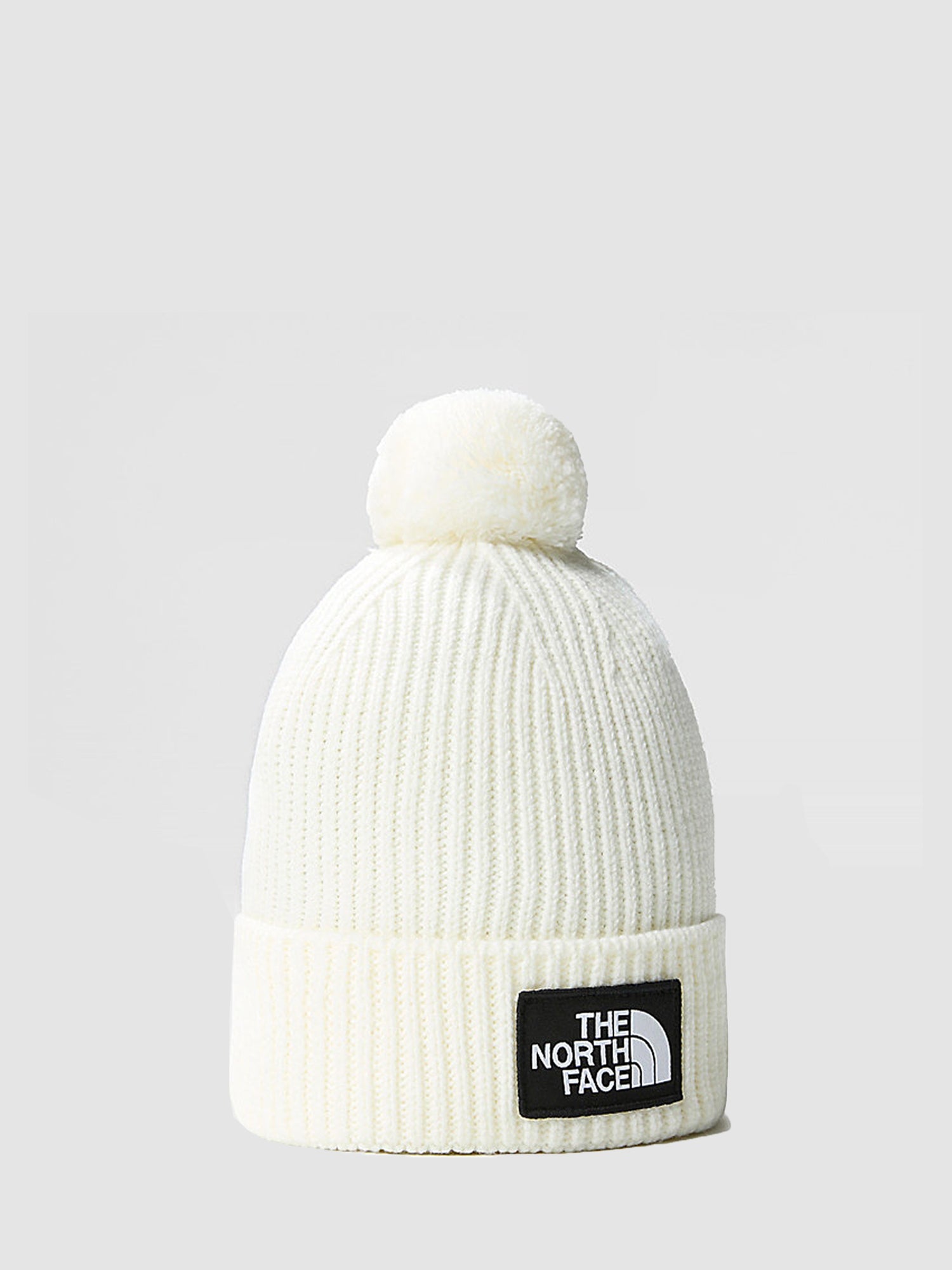 THE NORTH FACE CAPPELLO CON POMPON E LOGO BOX BIANCO