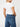 Guess t-shirt scollo a v con logo mini triangolo