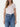 Guess t-shirt scollo a v con logo mini triangolo